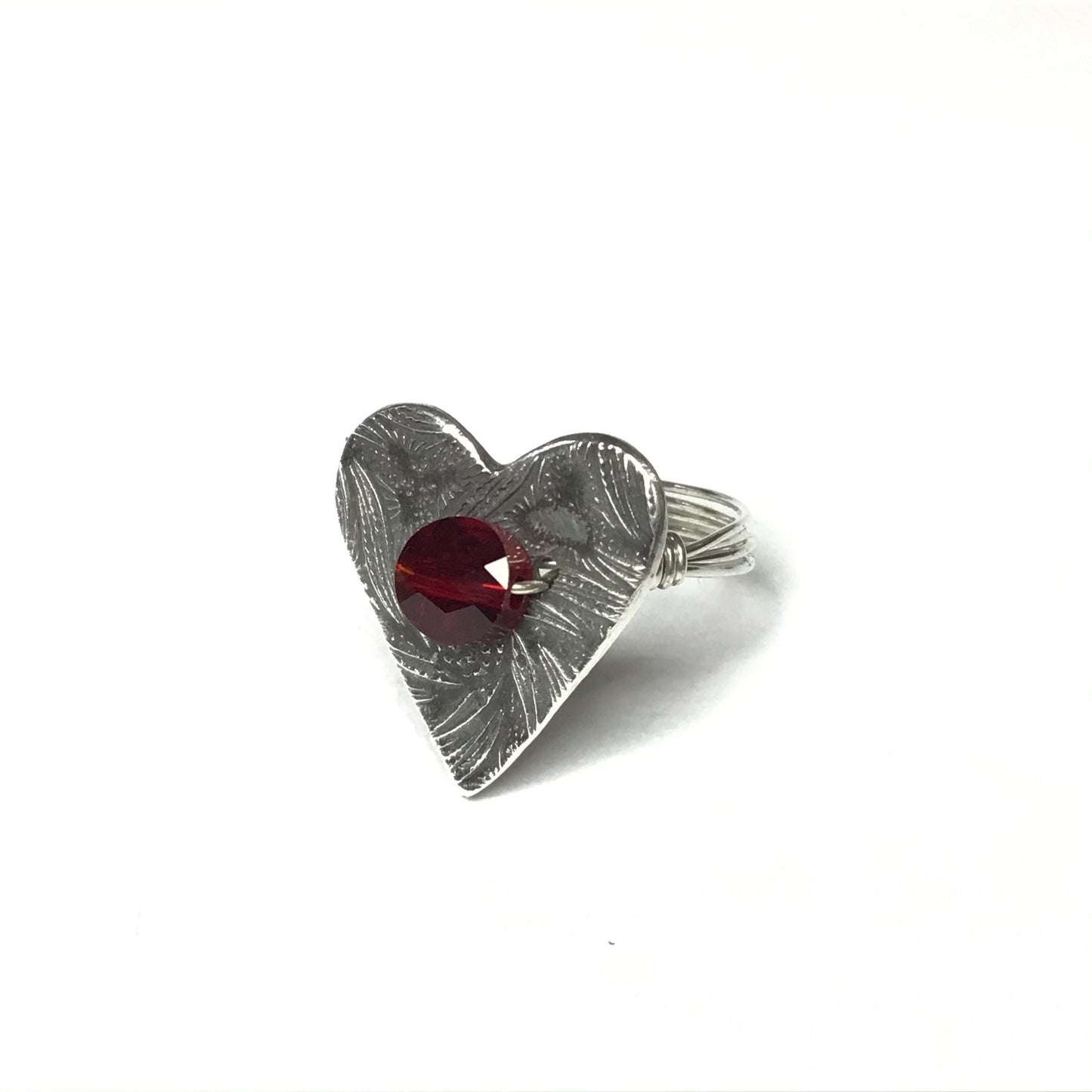 Sterling silver heart ring with ruby Swarovski crystal.