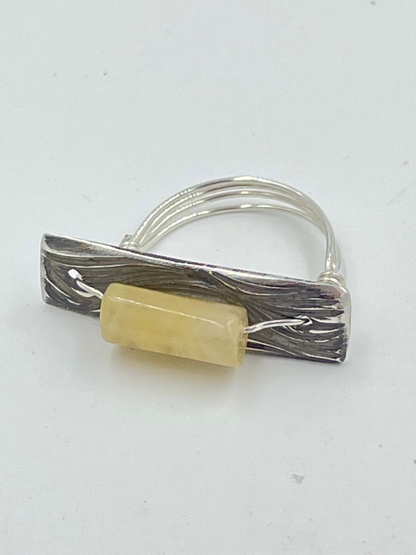 Sterling silver ring with orange calcite gemstone.